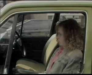 Dora sees the evil black car drive by