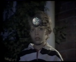 The Wirdegen use a device placed in Lewis to watch and monitor Bond