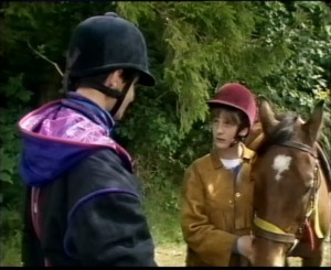 Bond tries to reassure Jake that he poses no threat or danger to them