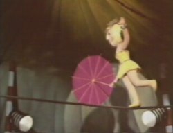 Mrs. Pimoulu has an act as well on the high wire