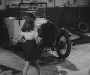 Moira checks out HAL 5 with her Uranium detector