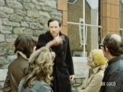 A preacher in the street is shouting about the evilness and wickedness that is all around them