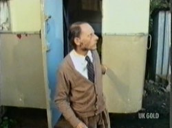 Mr. Furbelow comes out of the caravan oblivious to all that has happened