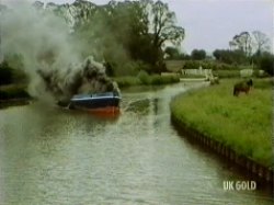 The boat is set alight at the bow section