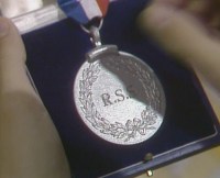 Matthew receives a medal