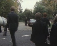 In the distance Matthew gets into a car