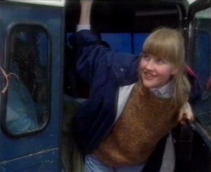 Nia nearly falls out of the back