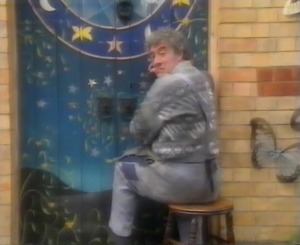 Mr. Llewelyn painting the Chapel door