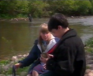 Nis tells Emlyn to take the spider