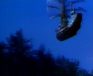 In the sky, the sailing ship that took Bethan is seen floating away