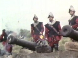 Spanish guns bombard the fort
