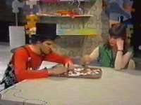 Adrian and Janet try to put together a white peice jigsaw