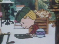 Sam returns to the shop and looks again at the book