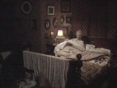 Mrs Bartholomew in her flat upstairs