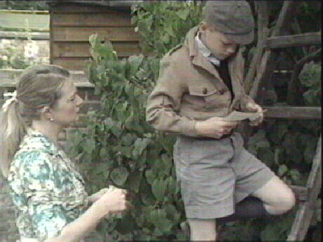 Tom sends a telegram home to say that he wants to stay at the flat for longer