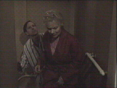 uncle Alan apologies to Mrs Batholomew for Tom's shouts