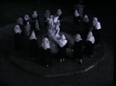 They encircle a terrified Sarah