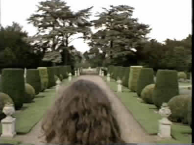 Minty in the garden - moondial in the distance