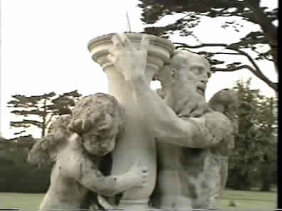 Statues supporting the Moondial