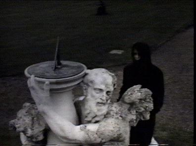 She reaches the moondial