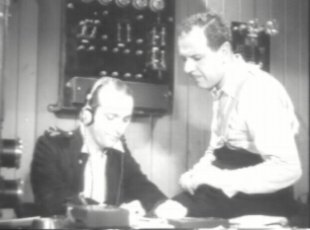 The radio operators aboard the Mary Fern are unaware of what has happened