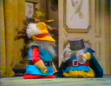 The man in the iron mask safely back at the Palace