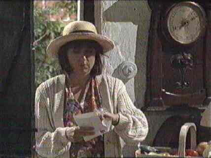 Marjorie opens the letter