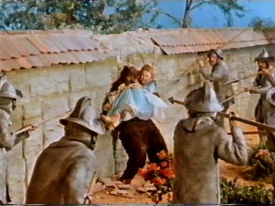 The bear crashes through the castle wall