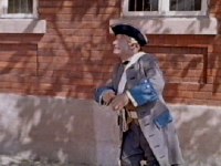 The policeman waits for Hans to climb down