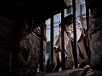 Hans appears at the prison bars