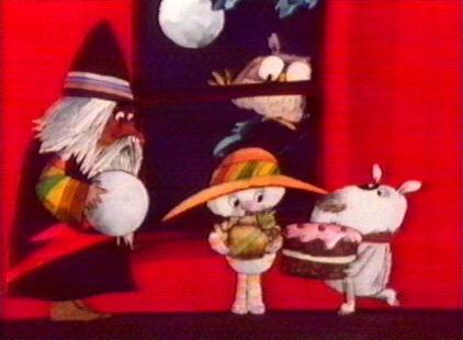 Cake for everyone as the owl watches the goings on.