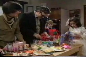 Lucy cuts her hand when she sees Alice's face  at the bottom of a glass